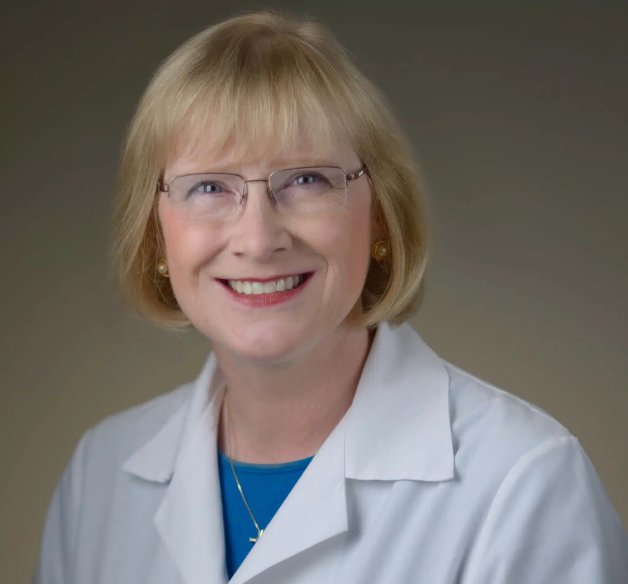 Professional head shot of Sue Swedo - 2025